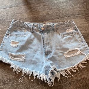 Studded shorts with rips